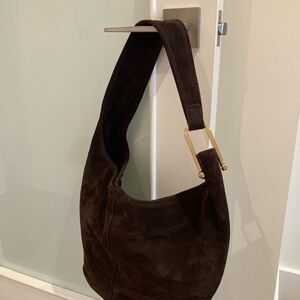 Michael Kors hobo handbag. New, never used. Chocolate brown suede. 16” x 10”